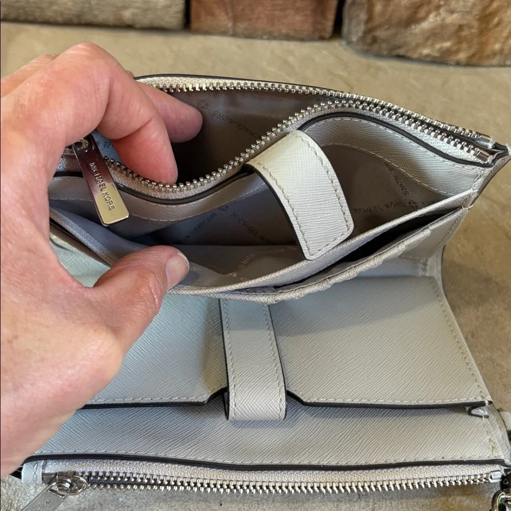 Michael Kors light grey wristlet/wallet